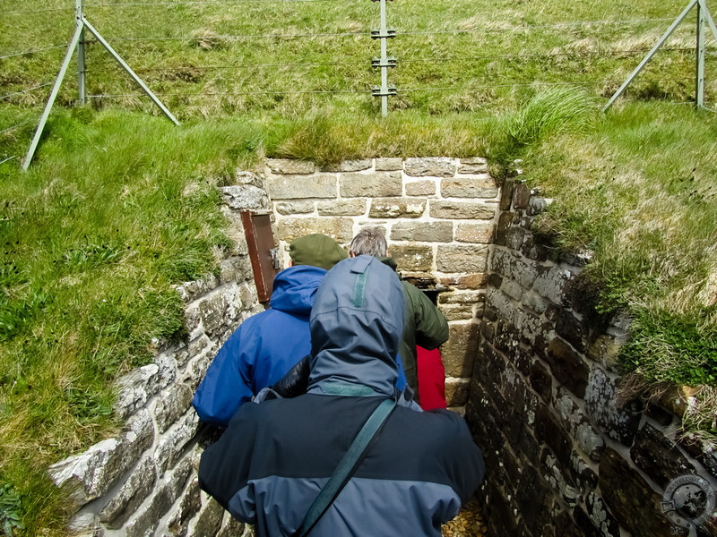 Entering Maeshowe Chambered Cairn