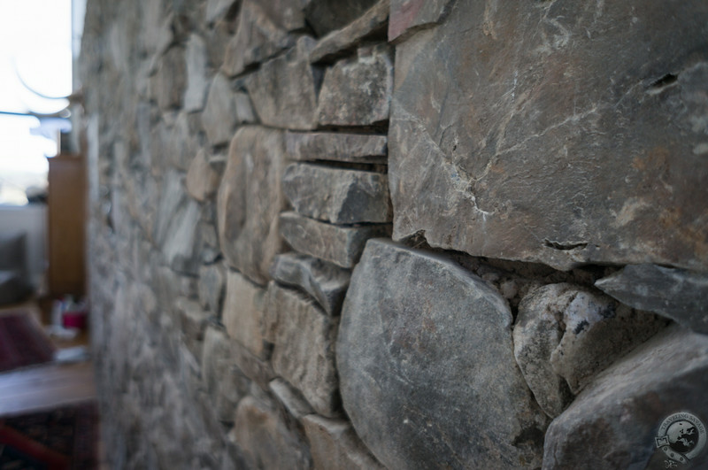 Local stone composes the main wall at Three Glens