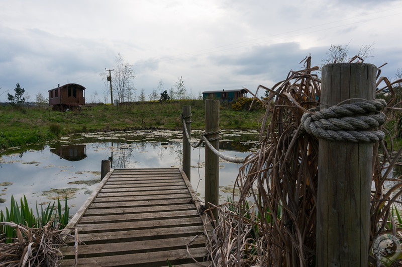 A small lochan sits at the center of the Roulotte Retreat