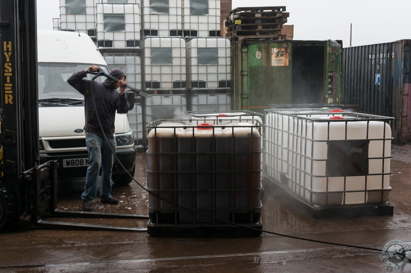 Hosing down the cider fermenters