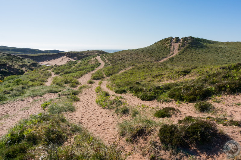 Sand dunes leading to Redpoint Beach