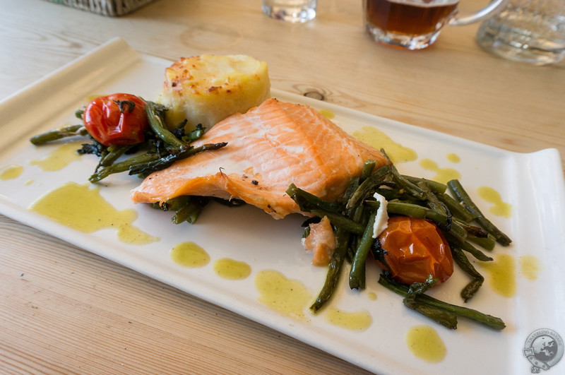 Fresh salmon with green beans, wilted tomatoes, and potato