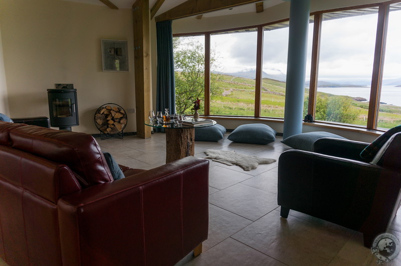 The living area with incredible views to the Summer Isles