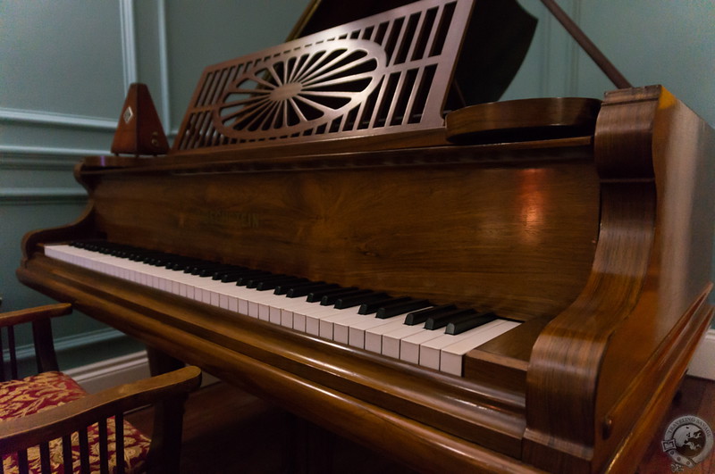 A Bechstein and a guitar in the corner of the common room