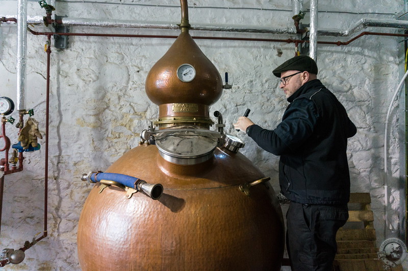 Assistant distiller David Hogg checking on Bella