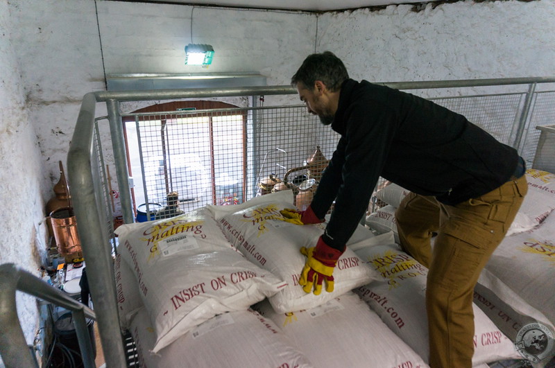 Unloading bags of malt